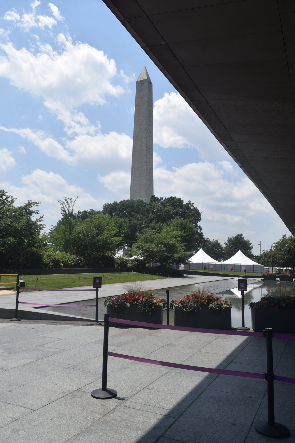 Washington Monument framed by architecture and sky